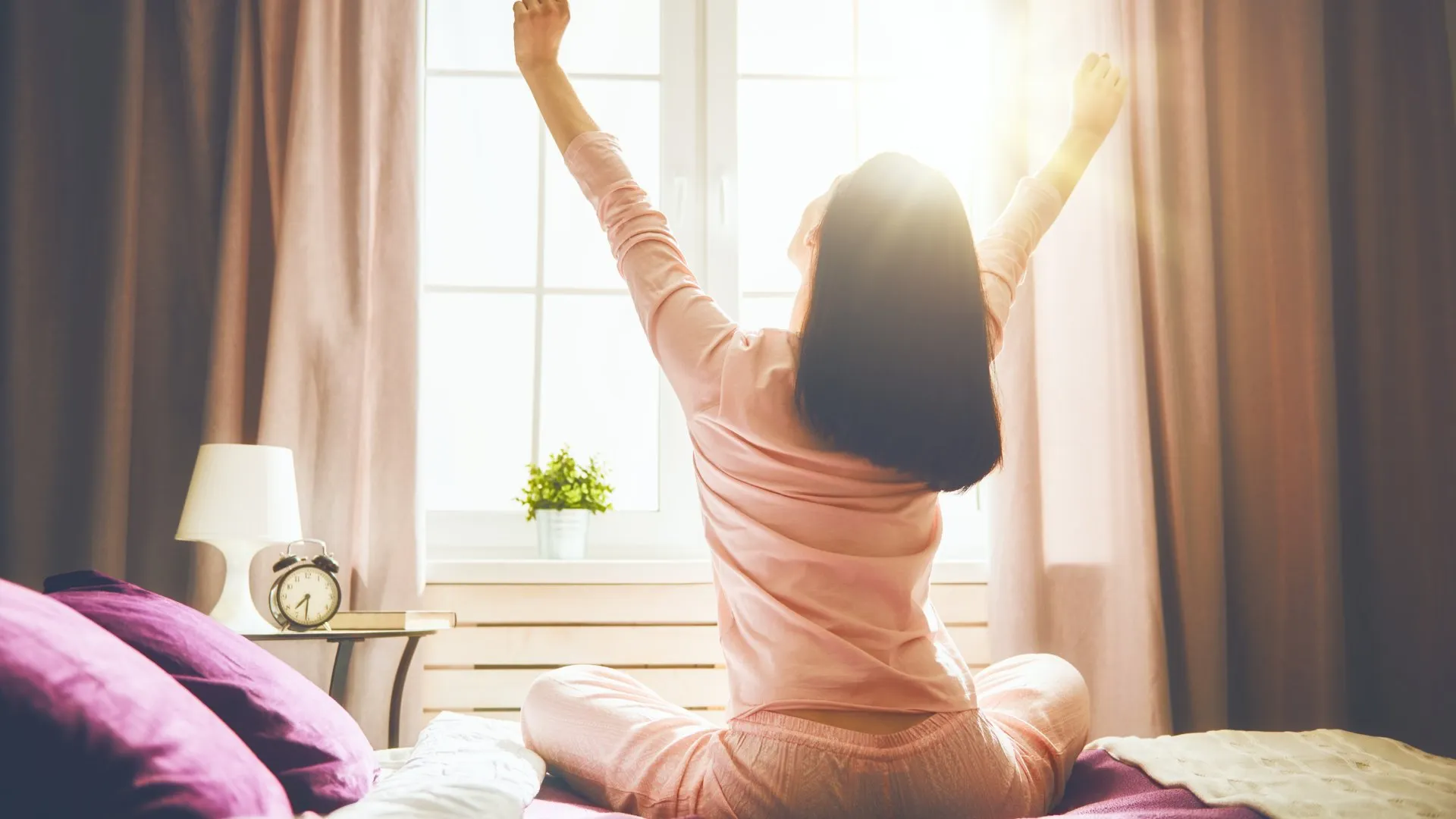 Person enjoying a calm morning routine with natural light